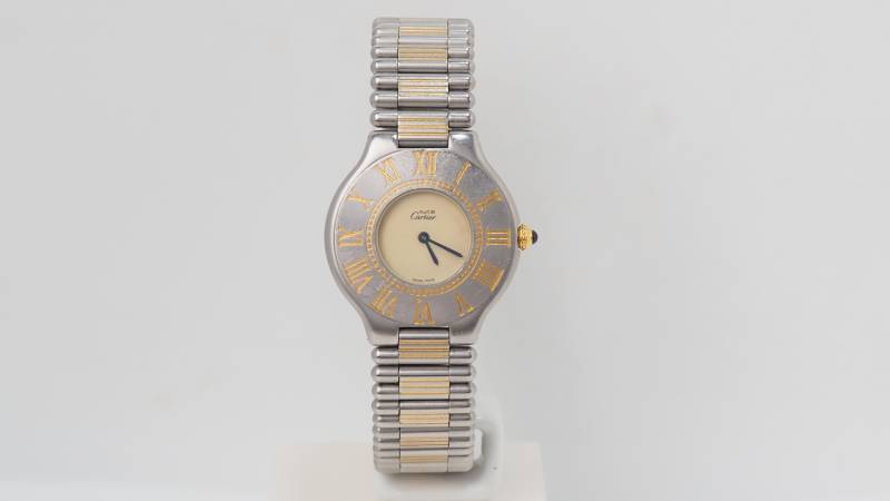Montre Cartier Must 21 en acier et plaqué or 