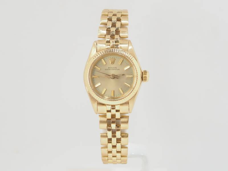 Montre Rolex Oyster Perpetual en or jaune 26mm en vente près du Vieux-Port de Marseille - rf 33022